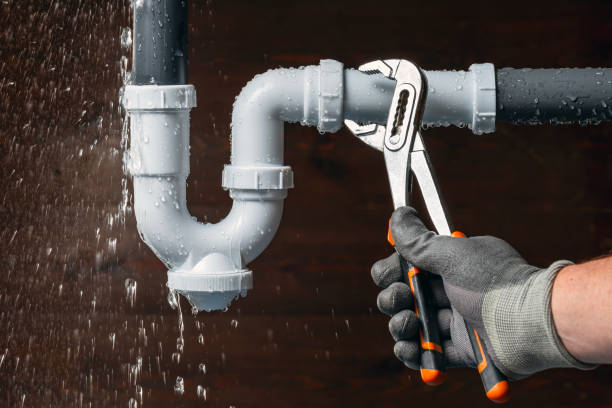 Professional Emergency Plumber technician working in Reinholds, PA